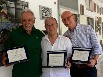 I tre neo pensionati con targa ricordo